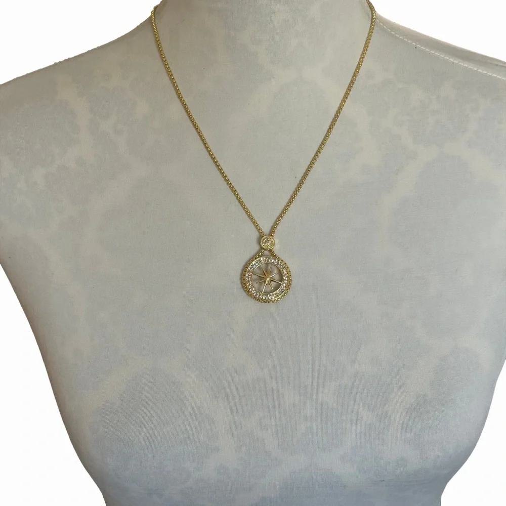 Gold Tone Compass Starburst Pendant Necklace with Crystal Halo
